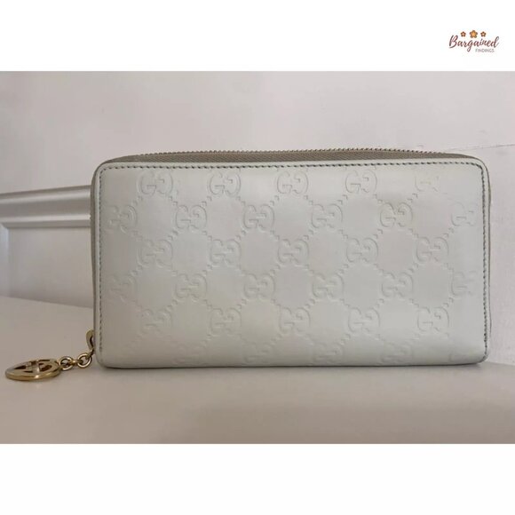 Authentic GUCCI Cream Guccissima Leather Interlocking G Heart Zip Around Wallet - Picture 4 of 12